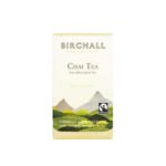 A box of Birchall Chai Tea, cherished by café baristas for its East African blend, features pale yellow packaging adorned with mountain imagery. It proudly sports the Fairtrade logo and includes 25 enveloped tea bags.