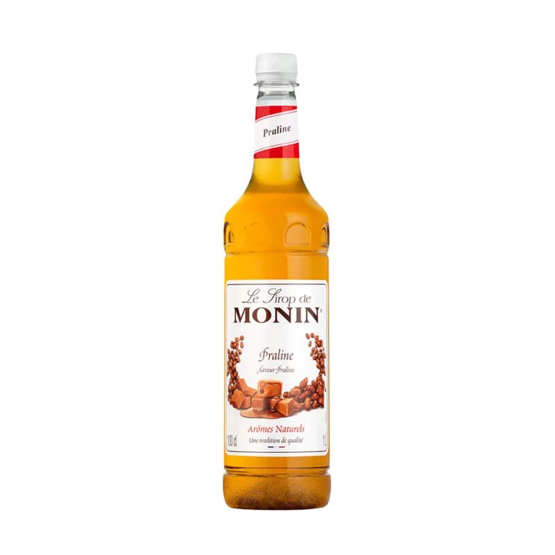 A bottle of Monin Praline syrup, designed for the café connoisseur, features a clear label with images of pralines and French text. Perfect for the barista touch, it’s filled with amber-colored syrup and topped with a red and white cap.